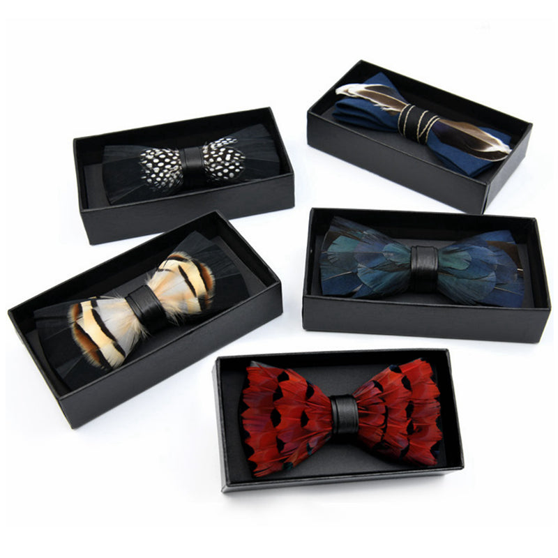 The image features a variety of neatly arranged bow ties in different colors and patterns. Some bow ties have solid colors, while others display intricate designs such as polka dots and stripes.