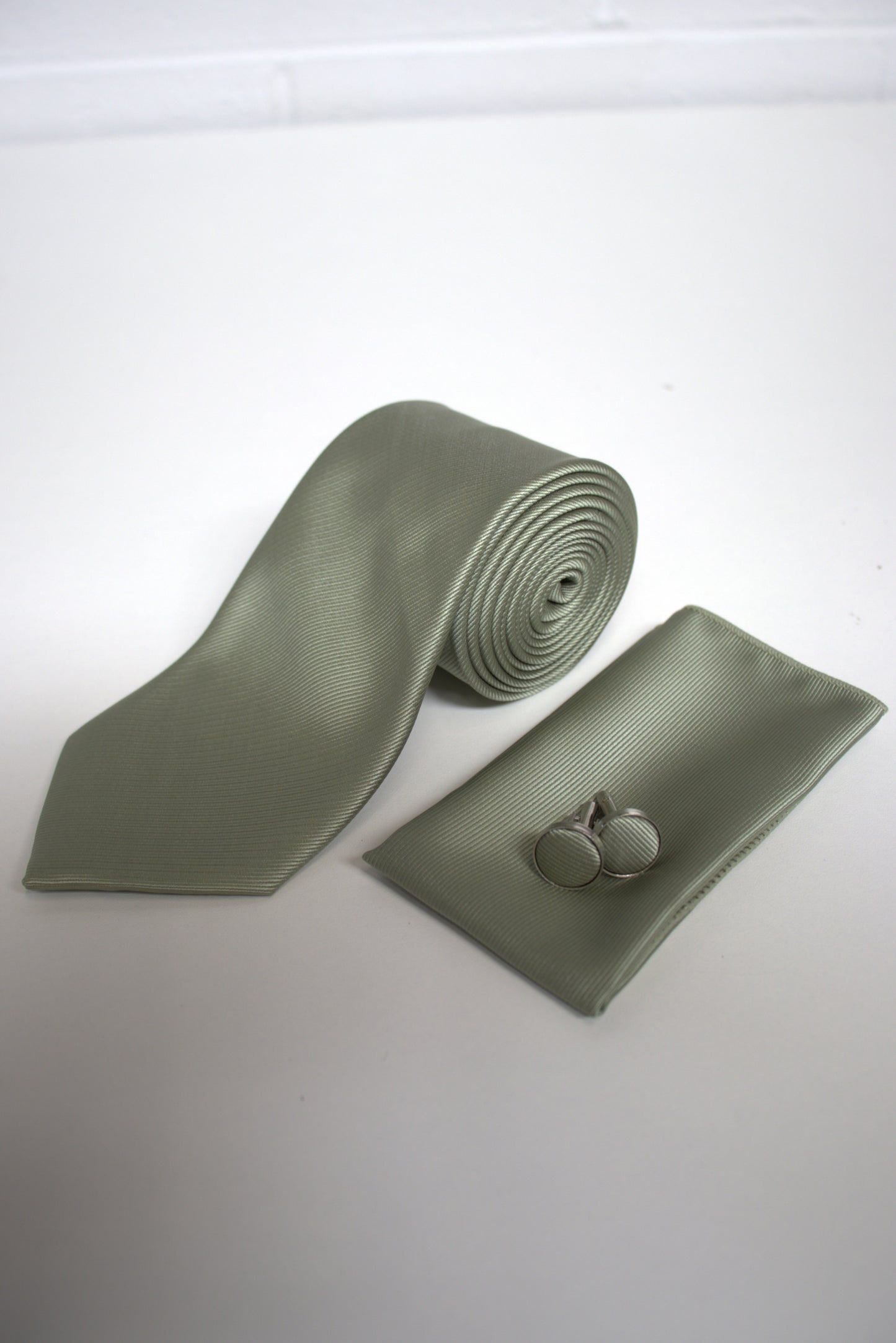Sage green tie set with matching pocket square and cufflinks for weddings, proms, and formal occasions.