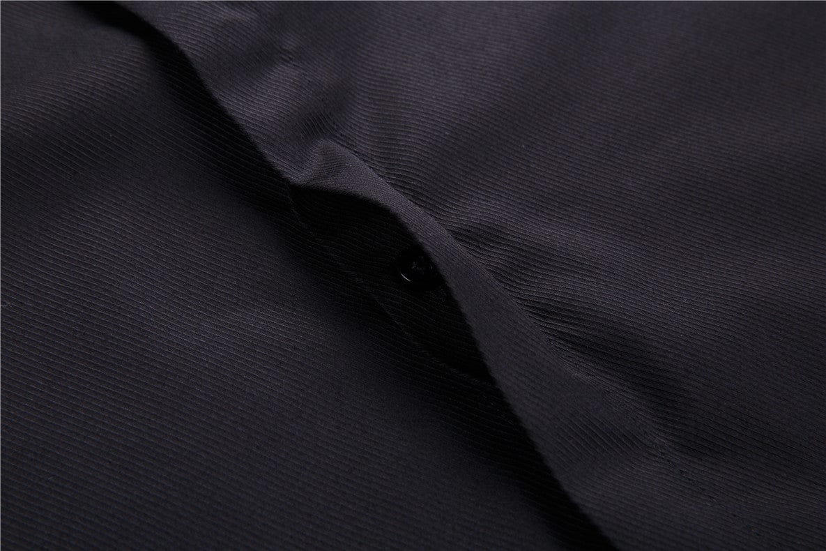 close up of doublecuff shirt showing hidden button feature