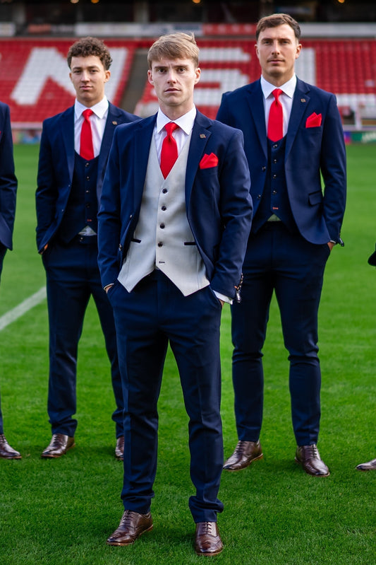 Should Grooms Match Groomsmen? | The SUITBAE Wedding Guide