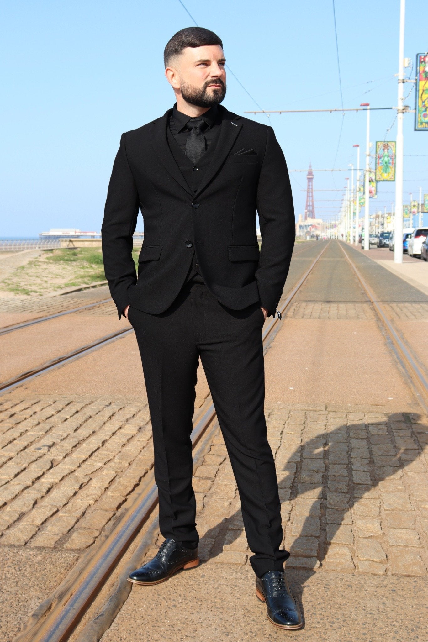 SUITBAE Diablo Black Three Piece Tuxedo – black wedding three piece suit with notch lapels, styled for formal events and black tie.