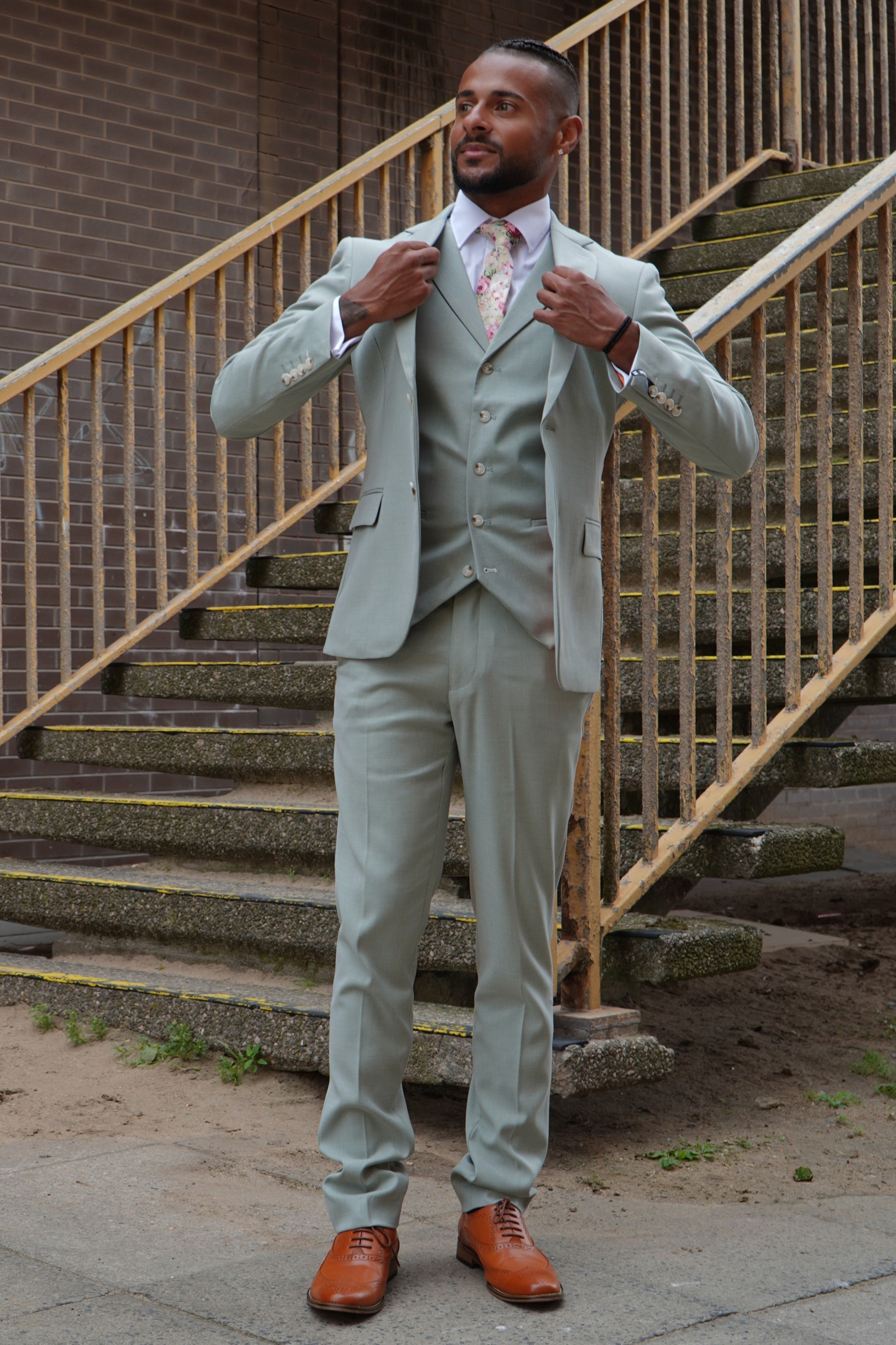 Callum Sage Three-Piece Suit by SUITBAE — lightweight sage tone, horn buttons, and silk waistcoat back for spring formalwear.