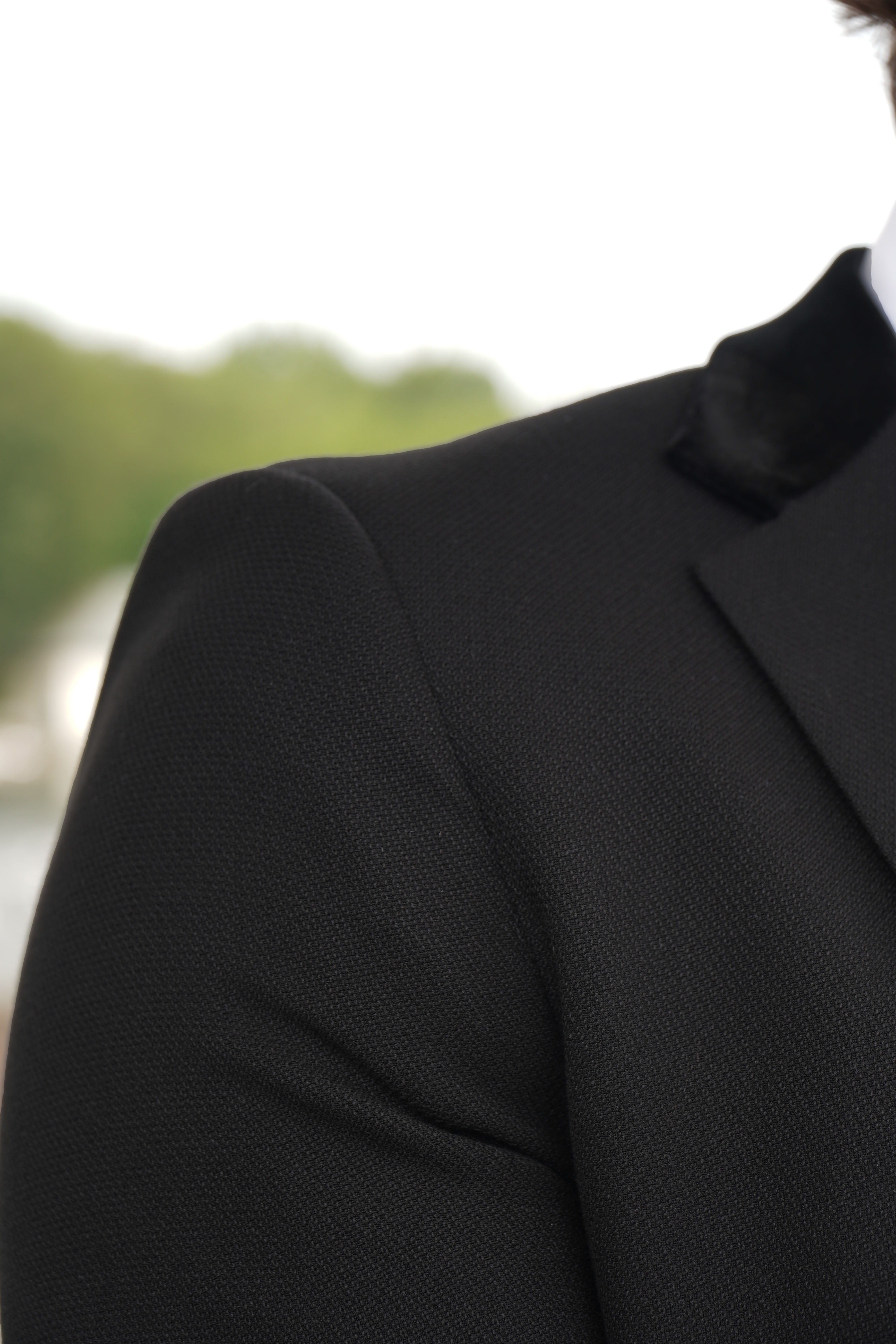 Majid Black Textured Suit by SUITBAE – flexible stretch fabric ideal for men who dislike stiff suits.