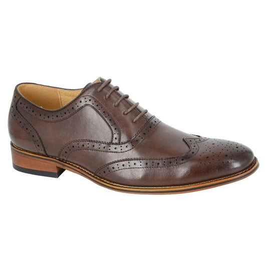 Solid brown leather brogue shoe with classic perforated detailing, low heel, and tan sole - part of the SUITBAE formal footwear collection.