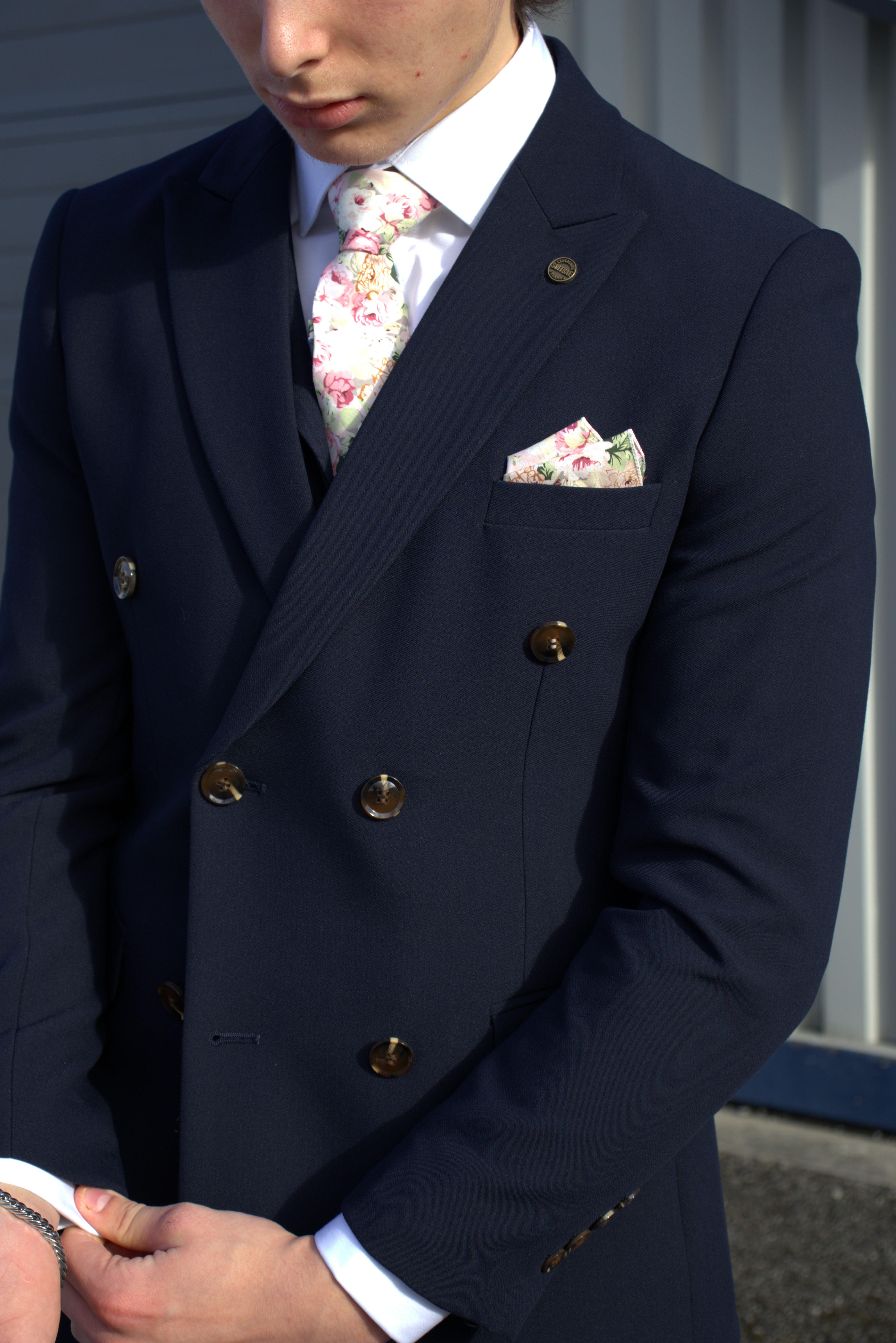 Modern DB suit in navy — sharp shoulder and tapered waist for 2026 styling.