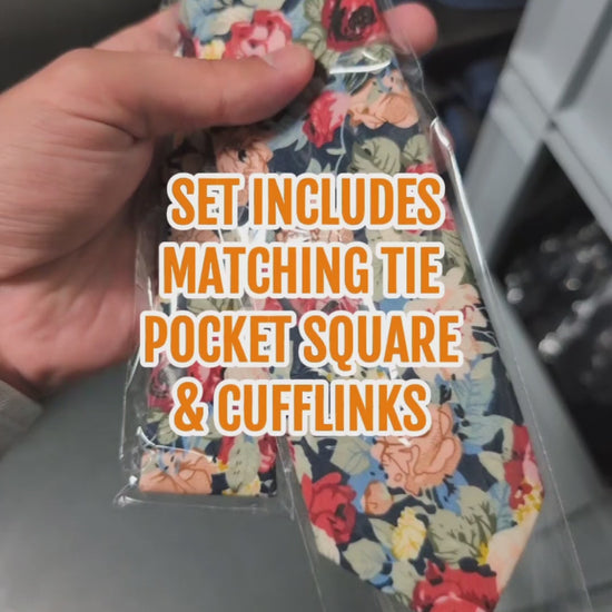 Video of navy floral tie set with red, pink and beige flowers, matching pocket square and cufflinks for weddings, proms and the races