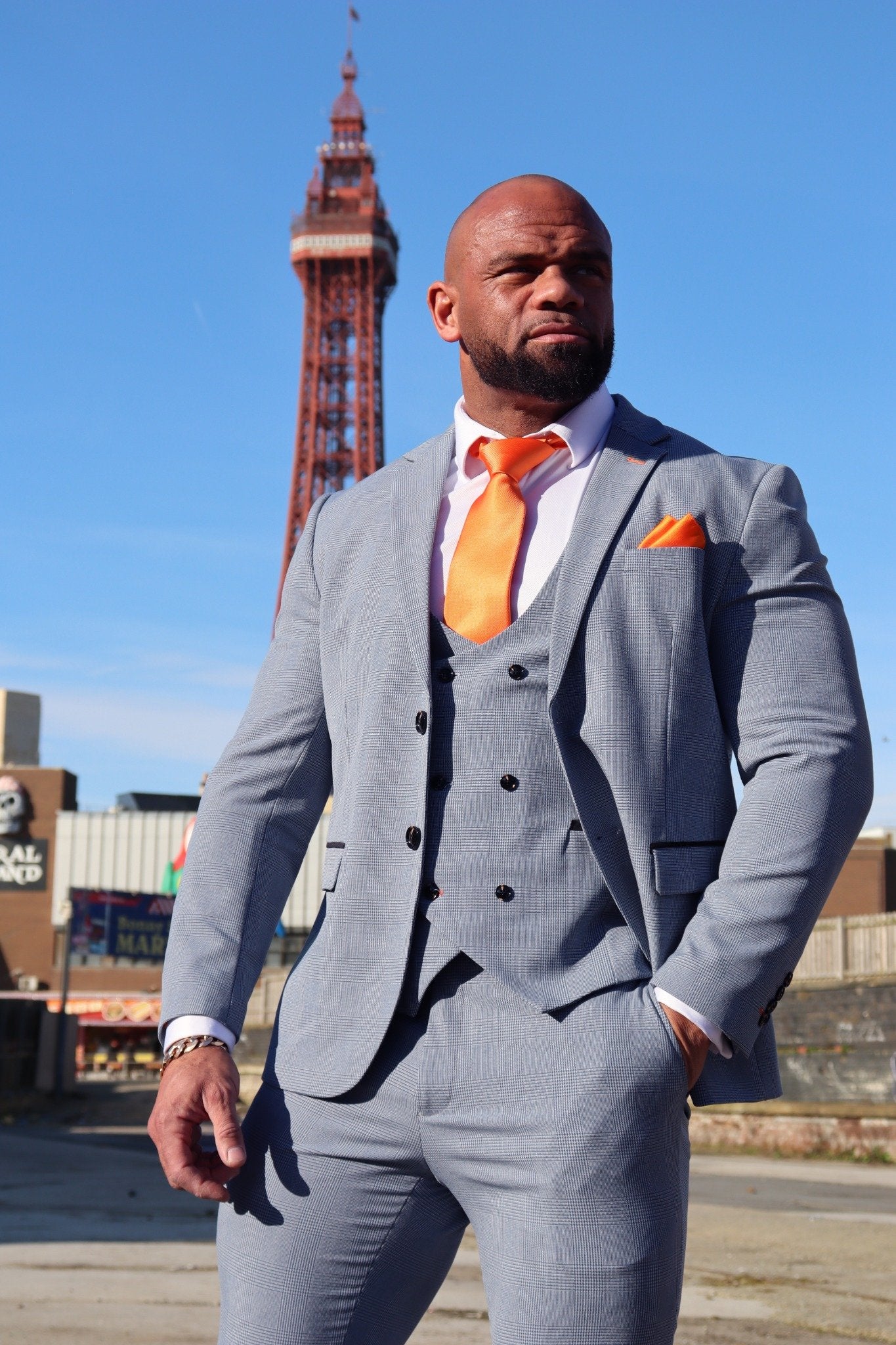 Model wearing the SUITBAE Charles Sky Three-Piece Suit — light blue tailored fit for spring weddings and race days.