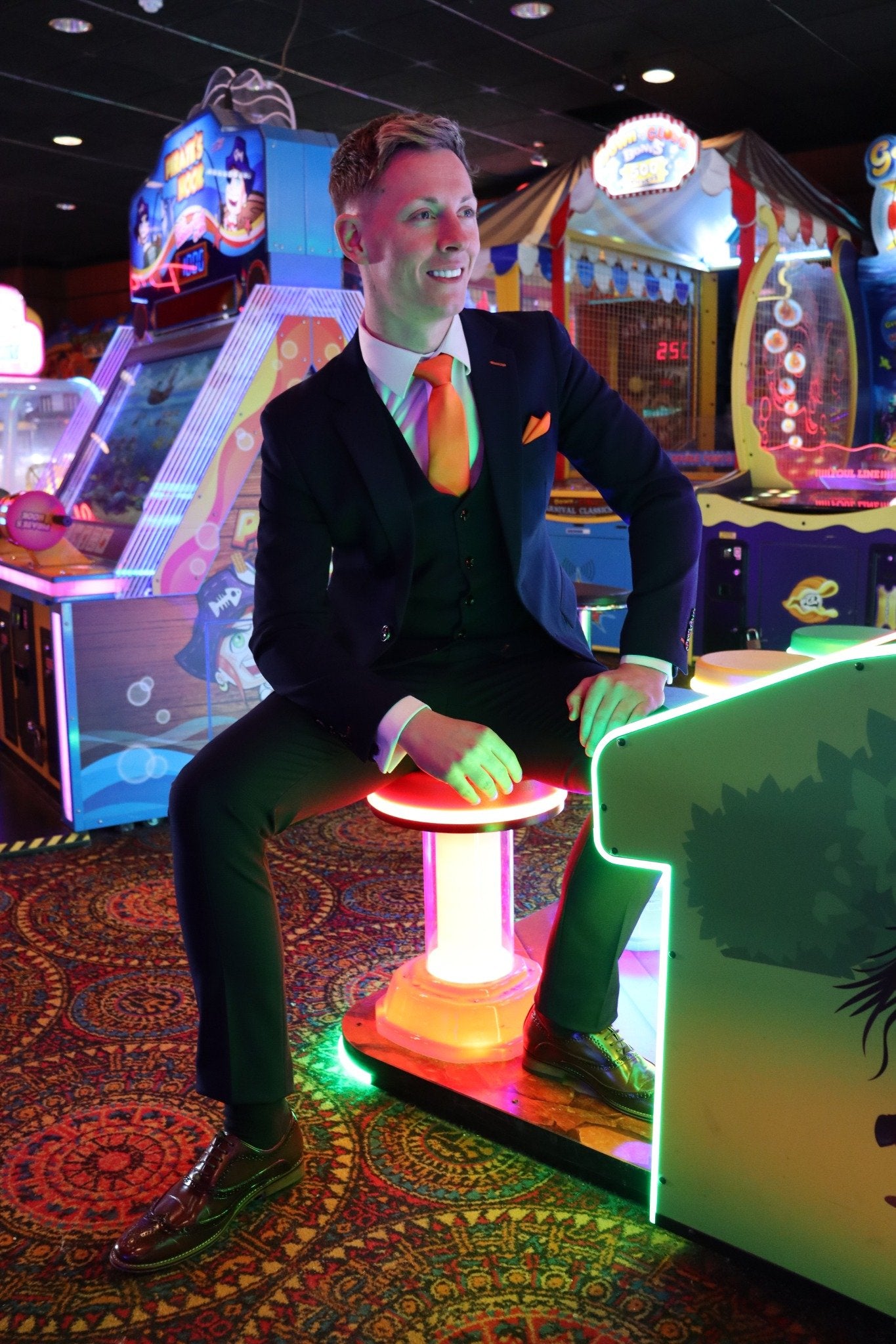 SUITBAE Charles Navy three-piece wedding suit that photographs clean in natural light