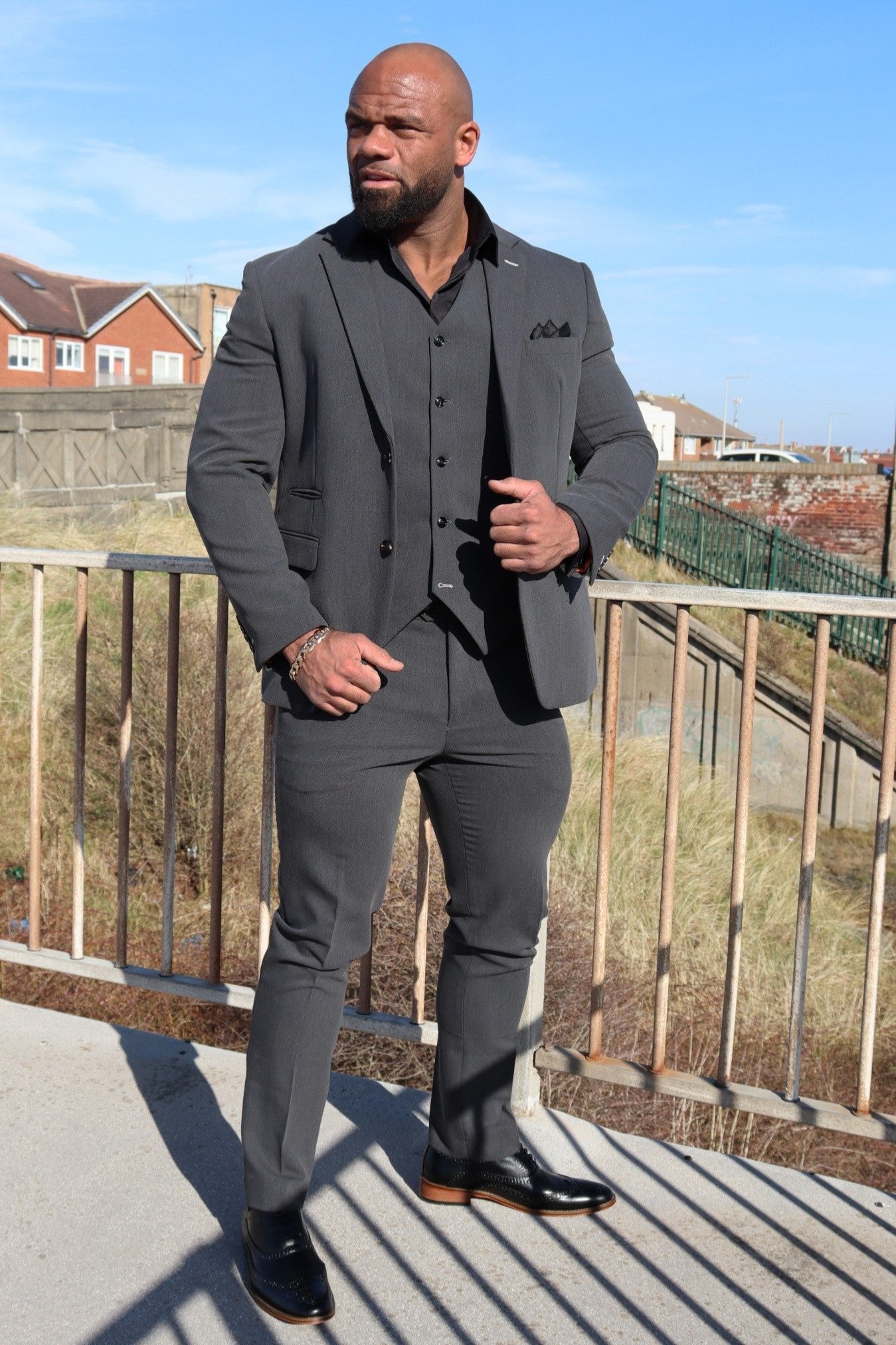 SUITBAE Vincent Charcoal Three-Piece Suit — mid-weight charcoal for winter weddings and workwear.