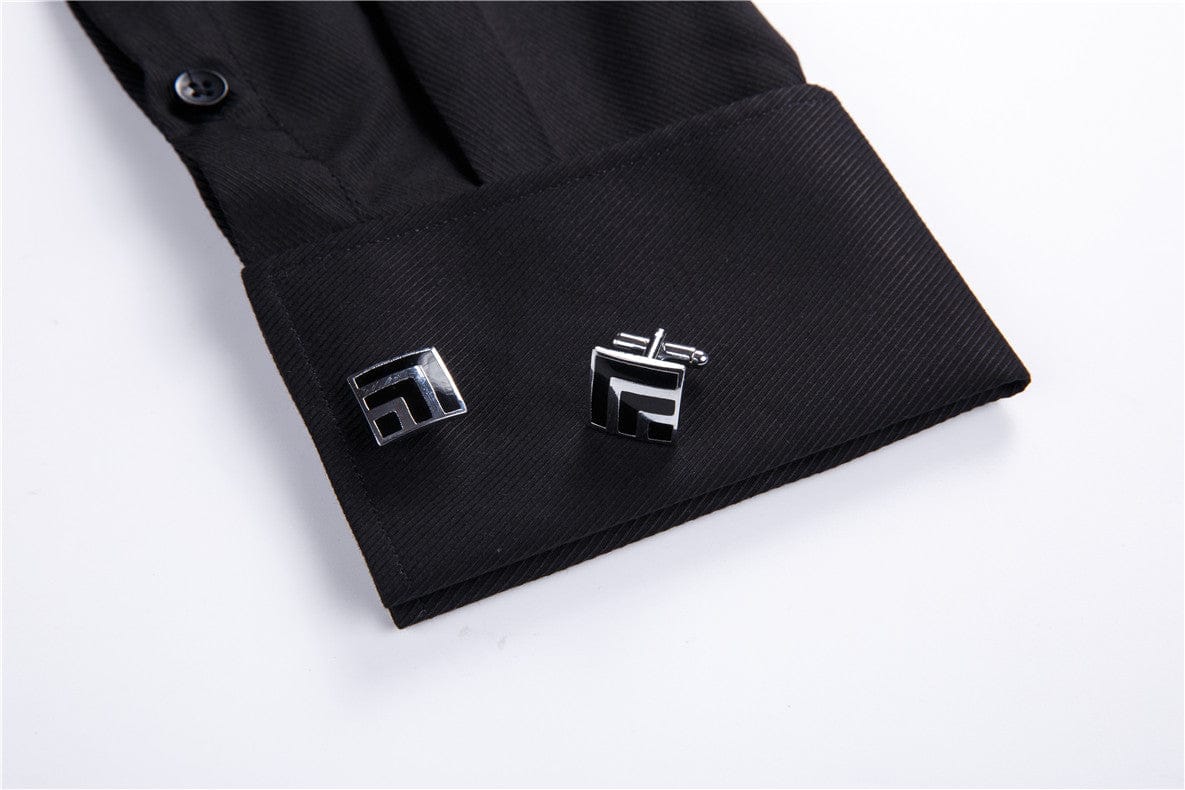 close up of cufflink sleeves with silver cufflinks