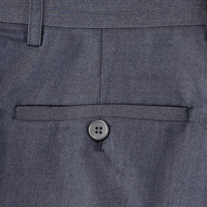 close up of back pocket of a charcoal grey suit