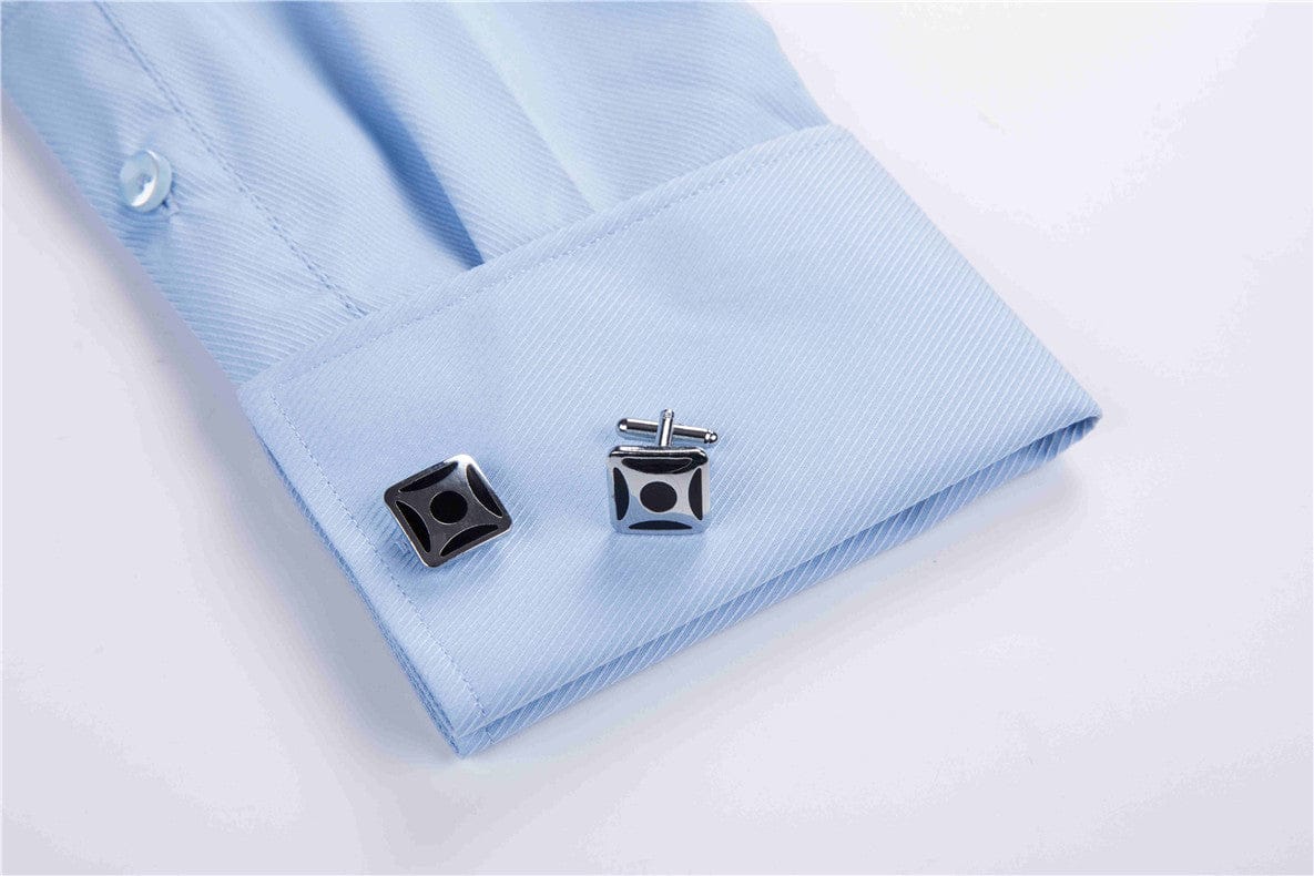 close up of doublecuff sleeve with silver cufflinks